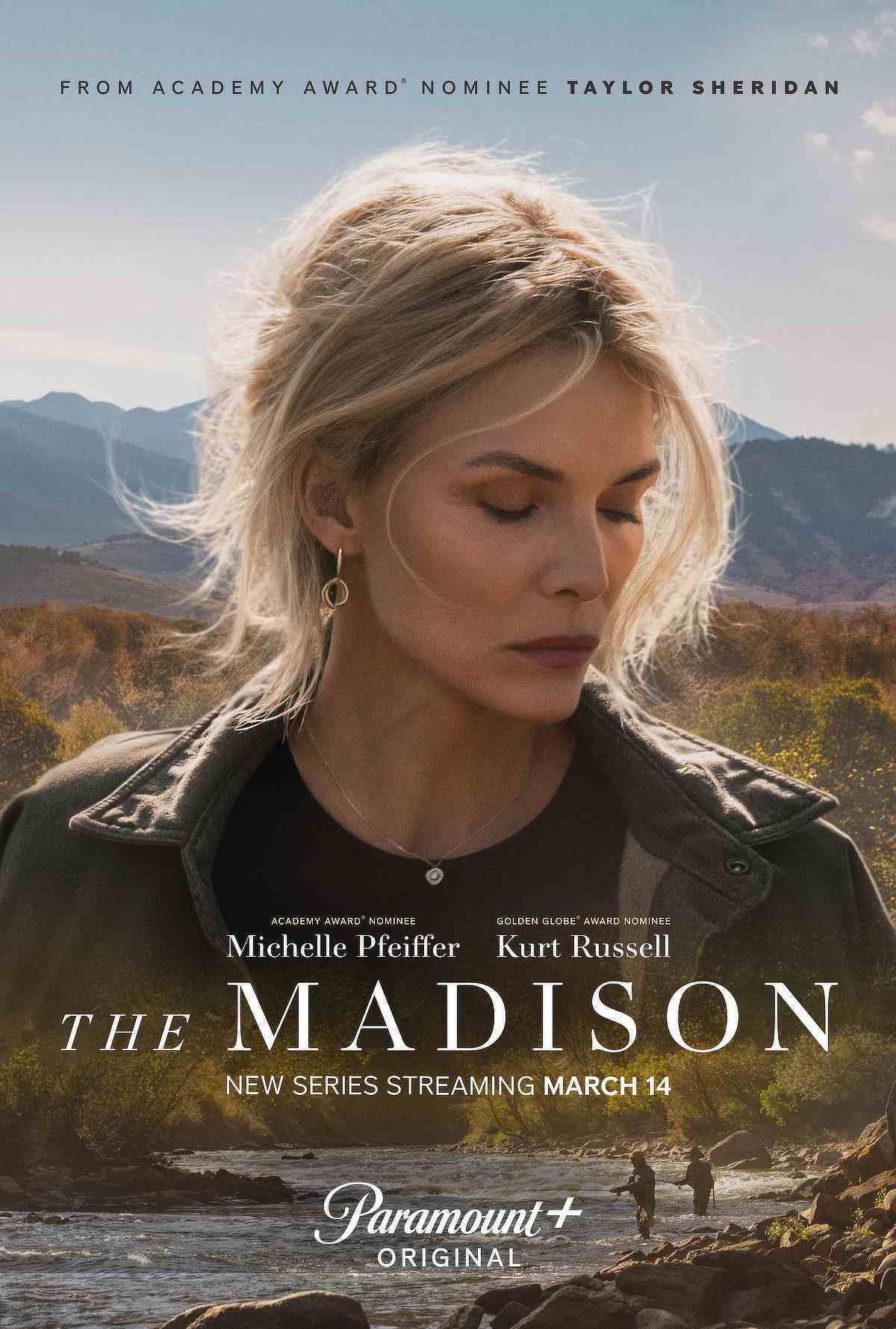 Auto-generated description: A woman with closed eyes stands outdoors against a backdrop of mountains and a river, promoting the new series The Madison starring Michelle Pfeiffer and Kurt Russell, streaming on Paramount+ starting March 14.
